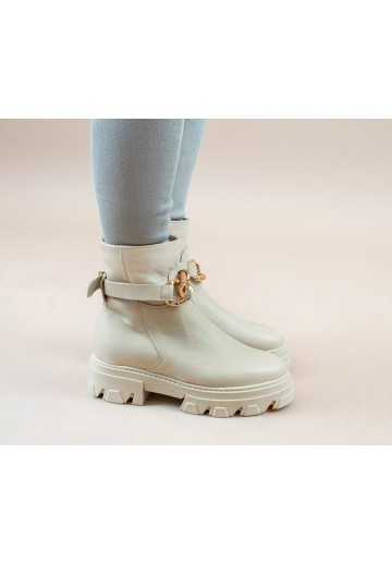 Beżowe botki zapinane na zamek