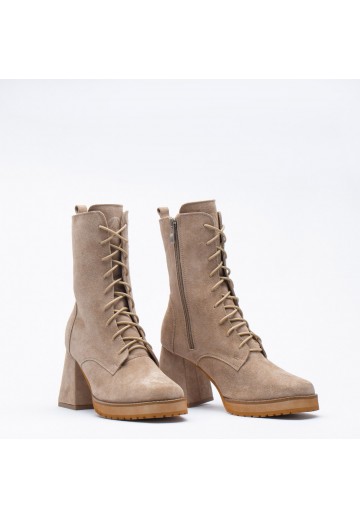 Beżowe botki zapinane na zamek