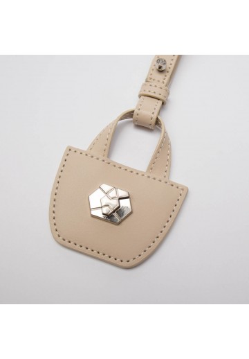 Beżowy brelok torebka -...